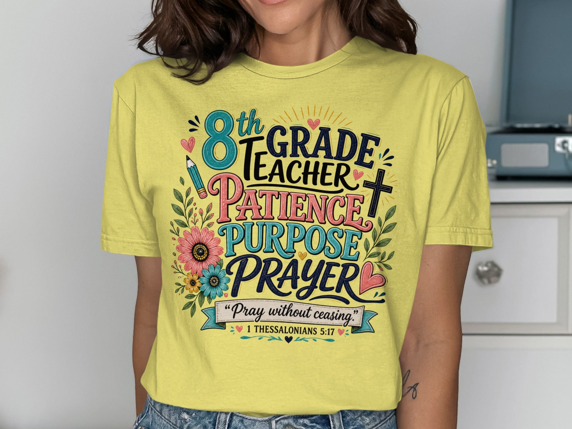 Yellow t-shirt with "8th Grade Teacher" in colorful text and scripture.
