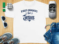 White t-shirt with "First Graders for Jesus" graphic and a small heart.
