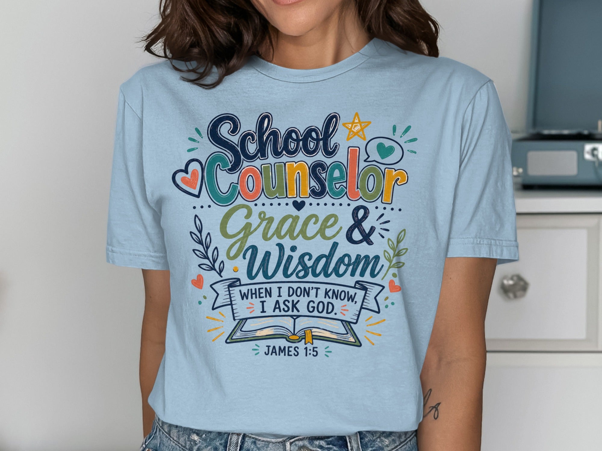 Light blue t-shirt with "School Counselor Grace & Wisdom" and Bible verse James 1:5.