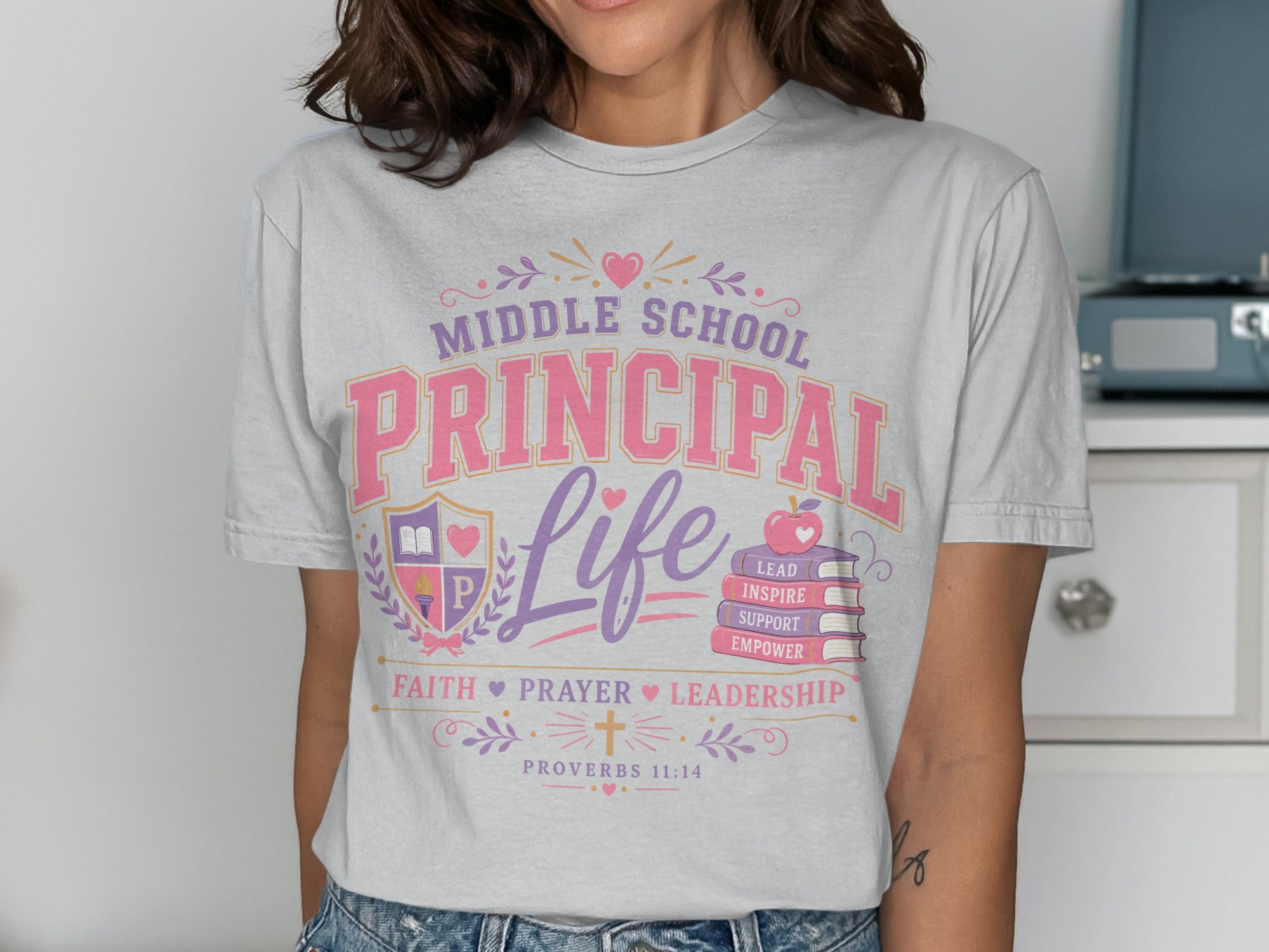 Light grey t-shirt with "Middle School Principal Life" text and Proverbs 11:14.