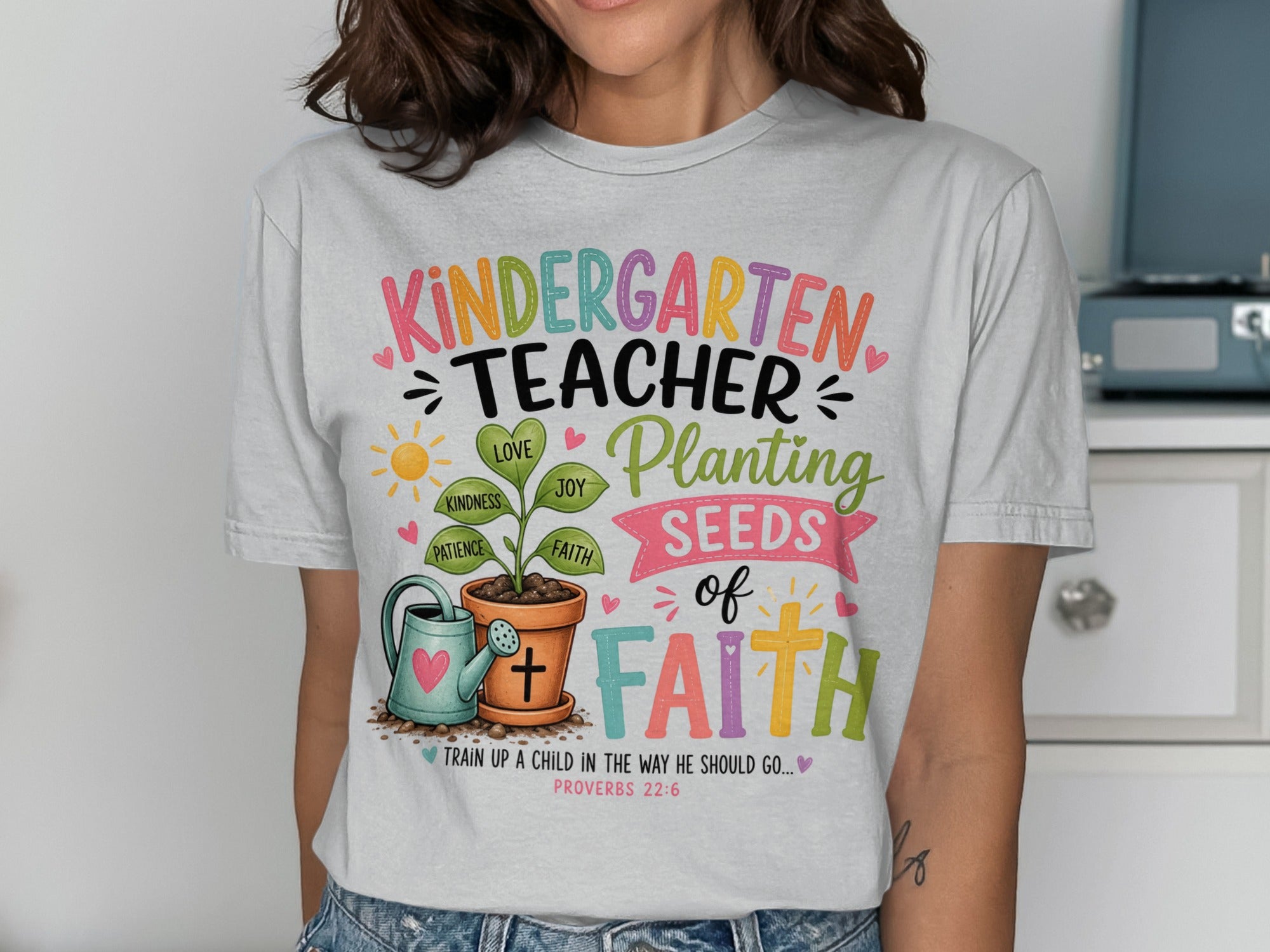 Kindergarten Teacher Planting Seeds of Faith t-shirt with Proverbs 22:6.