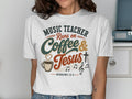 White t-shirt with "Music Teacher Runs on Coffee & Jesus" graphic and Hebrews 13:5.