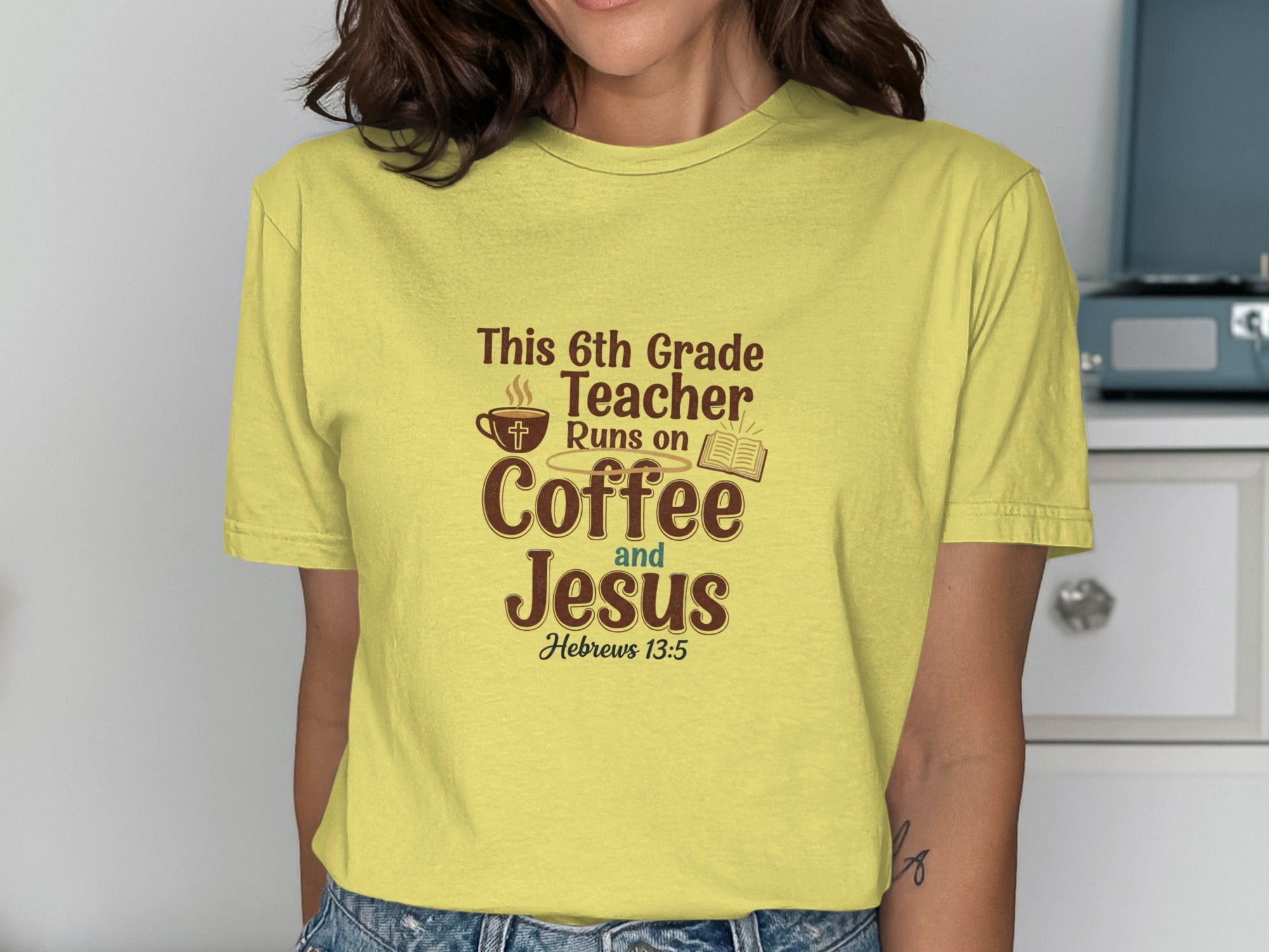 Yellow t-shirt with "This 6th Grade Runs on Coffee and Jesus" text.