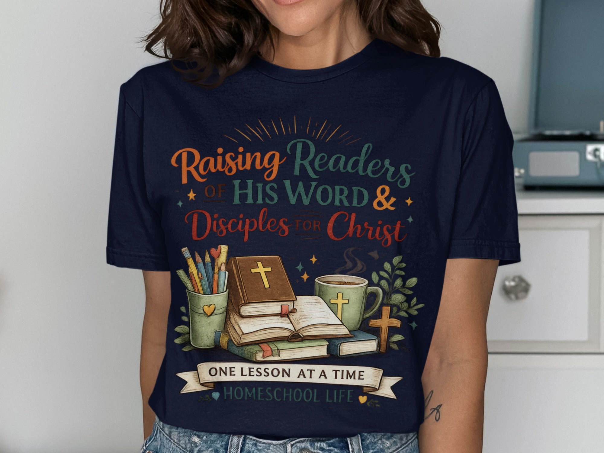 T-shirt with "Raising Readers of His Word & Disciples for Christ" and "Homeschool Life."