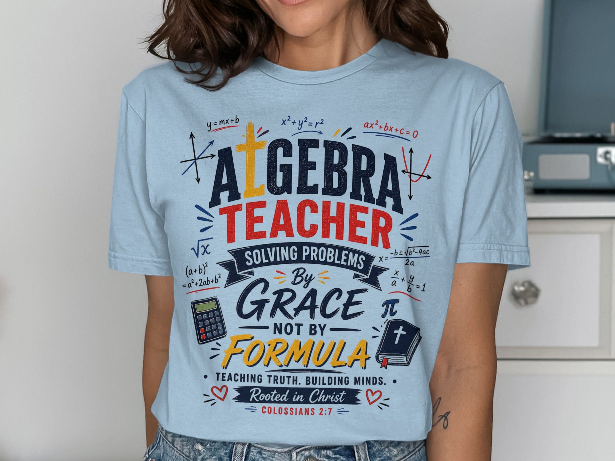 Algebra Teacher graphic tee with math equations and biblical verse.