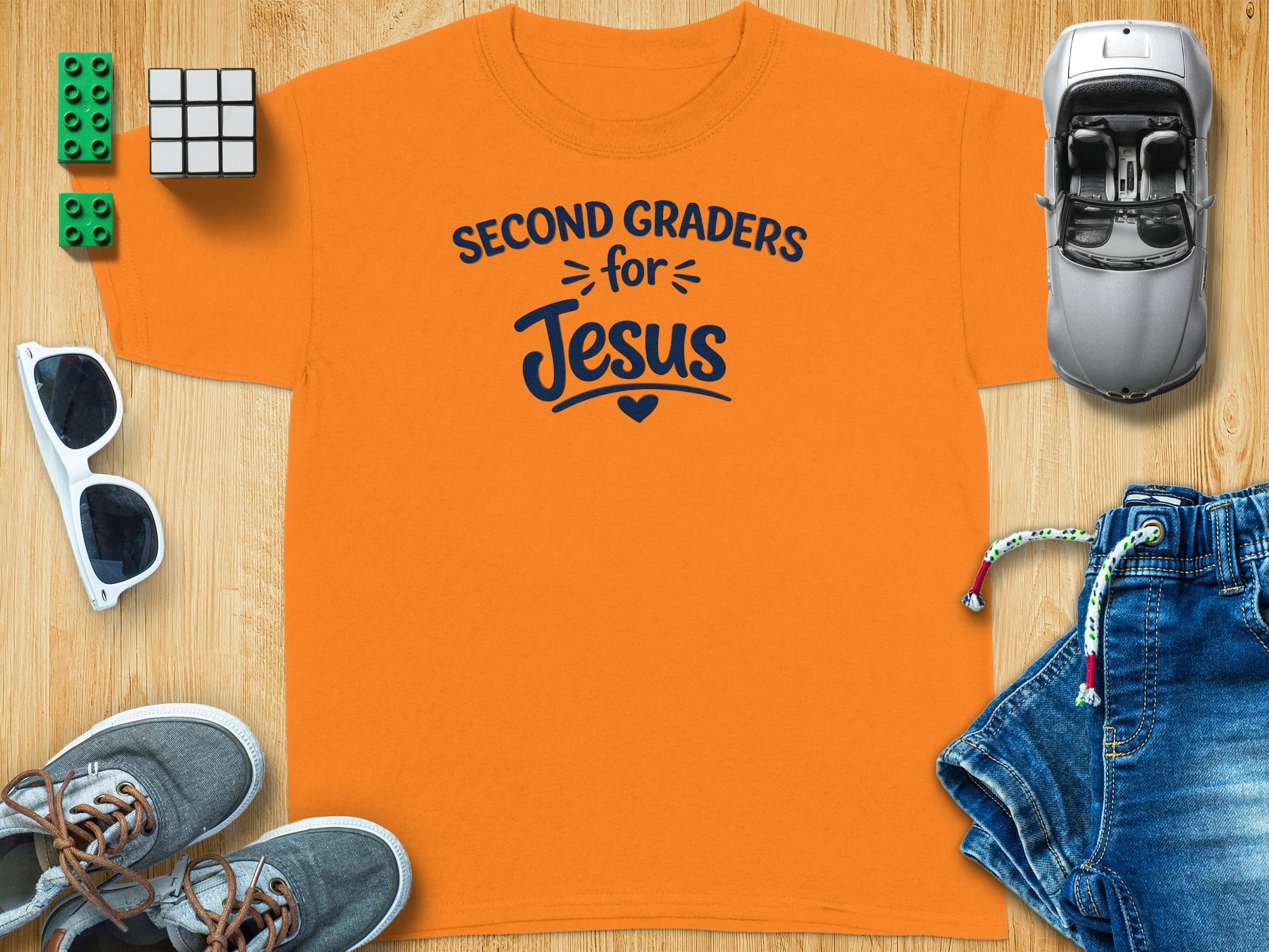 Orange t-shirt with "Second Graders for Jesus" text and a heart.