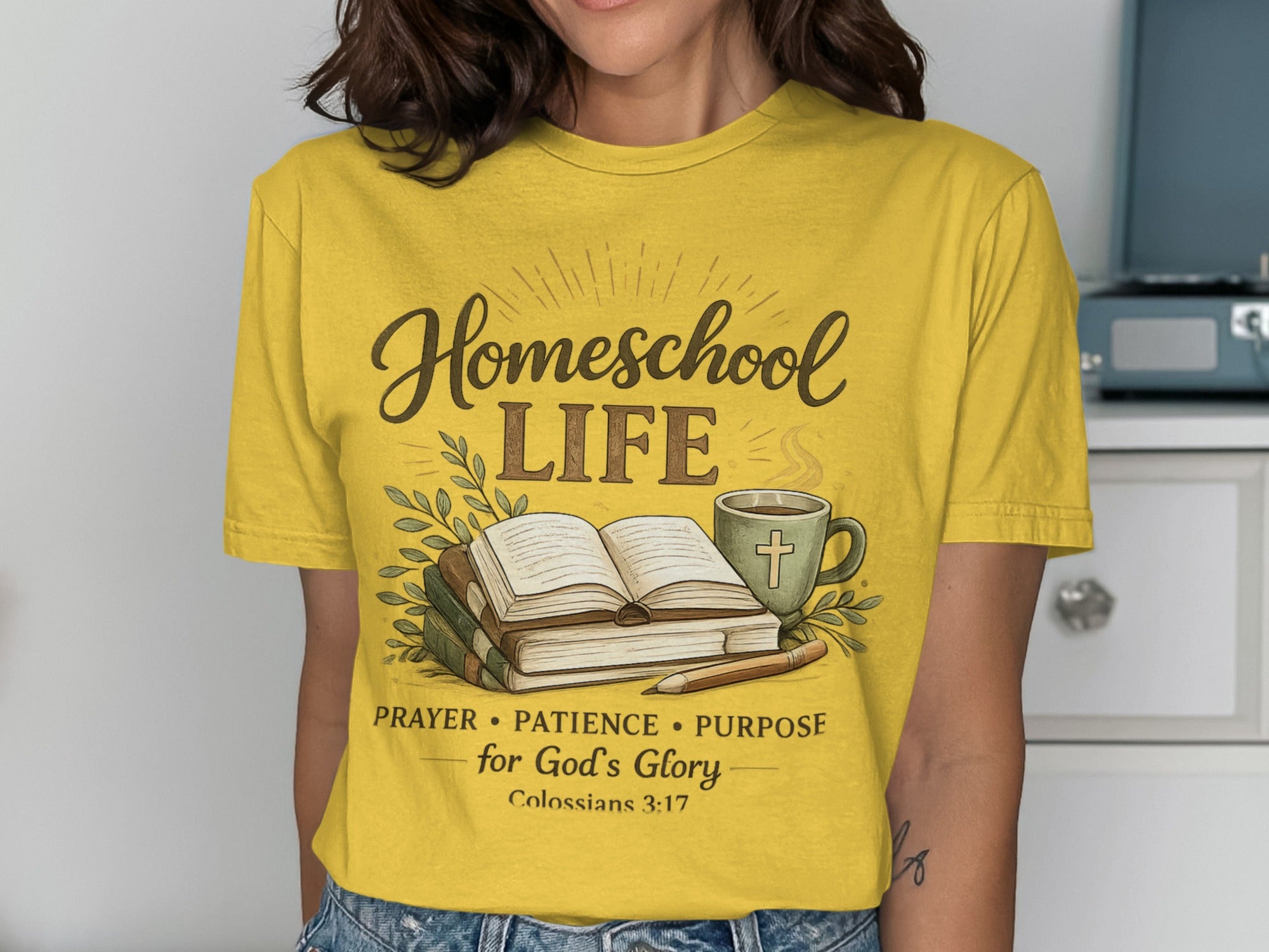 Yellow t-shirt with "Homeschool LIFE" and scripture about prayer, patience, and purpose.