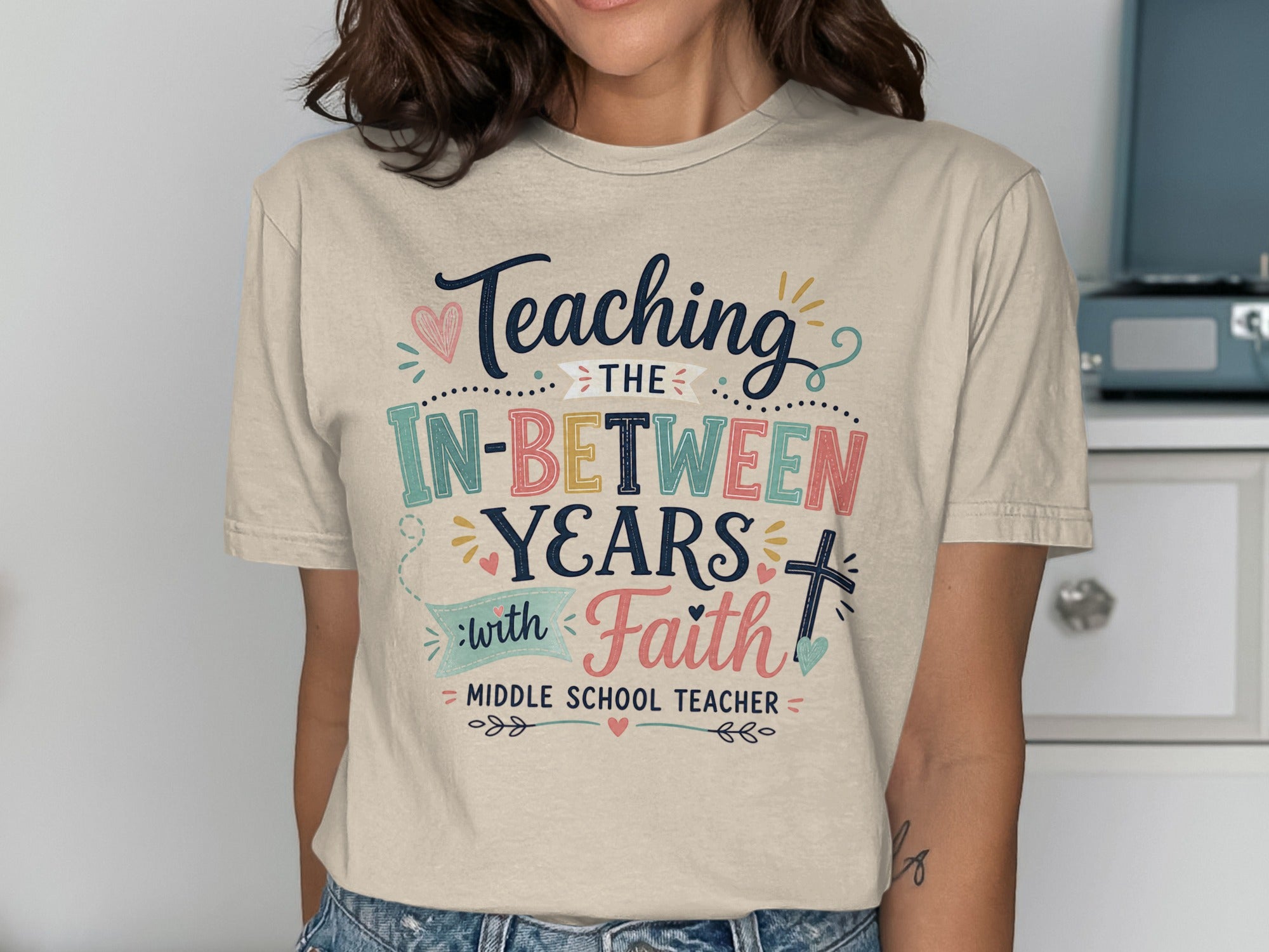 T-shirt with text "Teaching the In-Between Years with Faith Middle School Teacher".