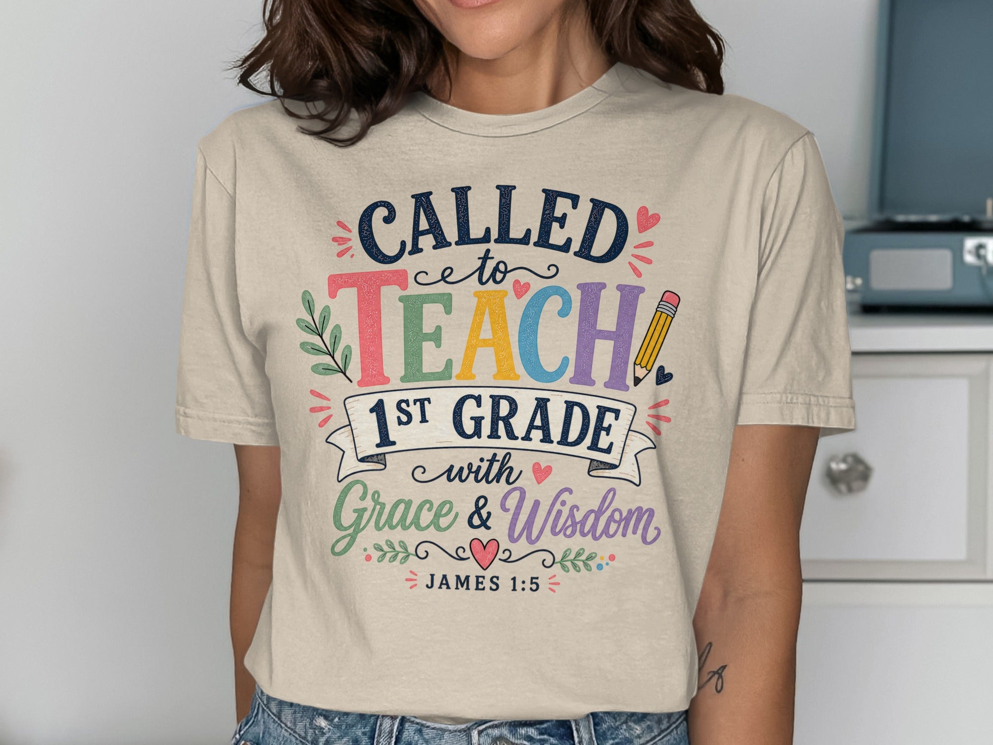 T-shirt with "CALLED to TEACH 1ST GRADE with Grace & Wisdom JAMES 1:5" text.