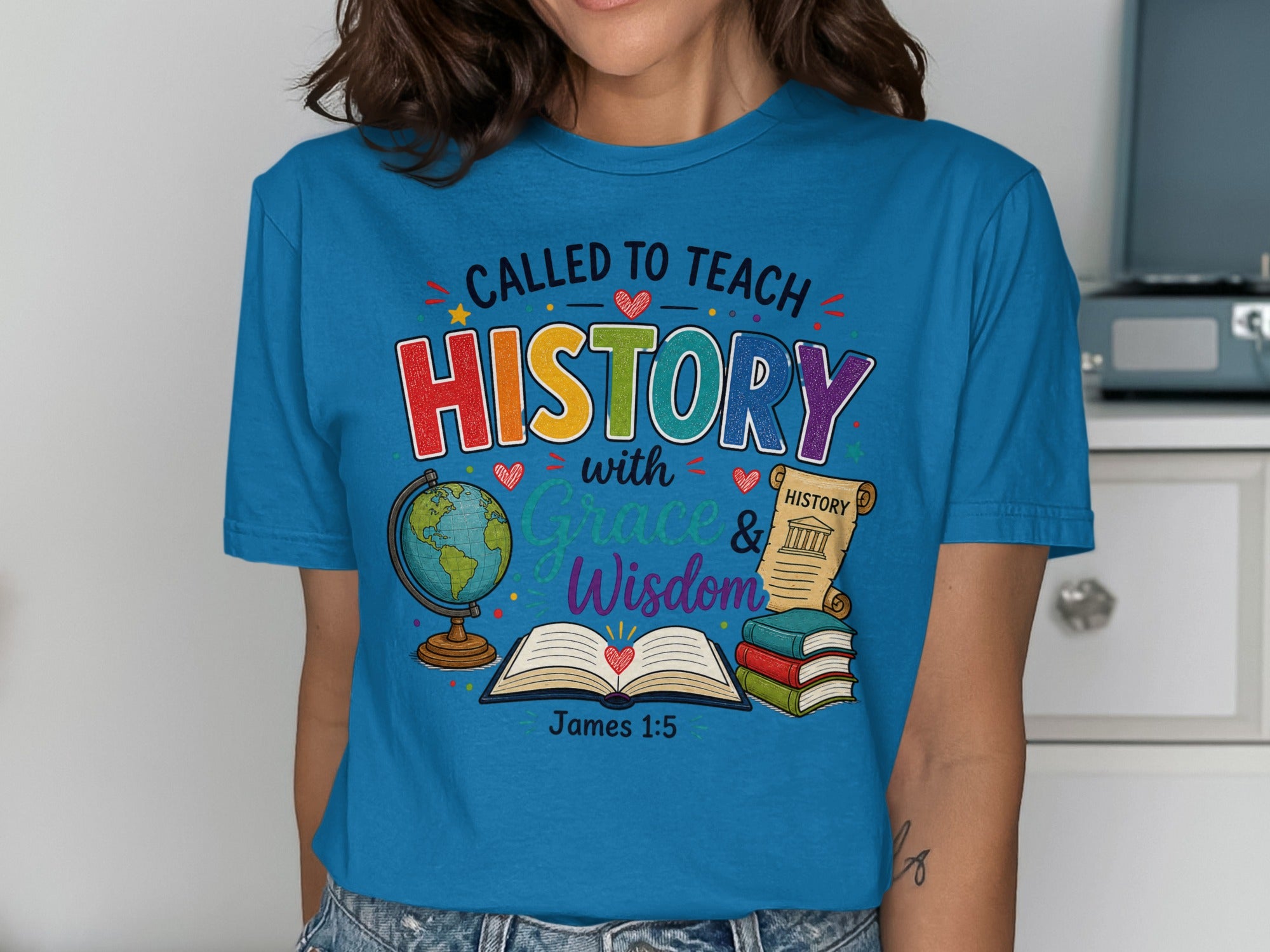 Blue t-shirt with "Called to Teach History with Grace & Wisdom" and a bible verse.
