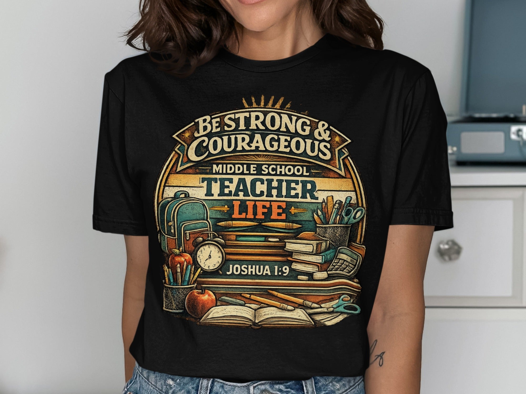 Be Strong & Courageous Middle School Teacher Life graphic t-shirt.
