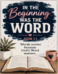 "In the beginning was the Word" artwork with Bible, plant, and coffee.