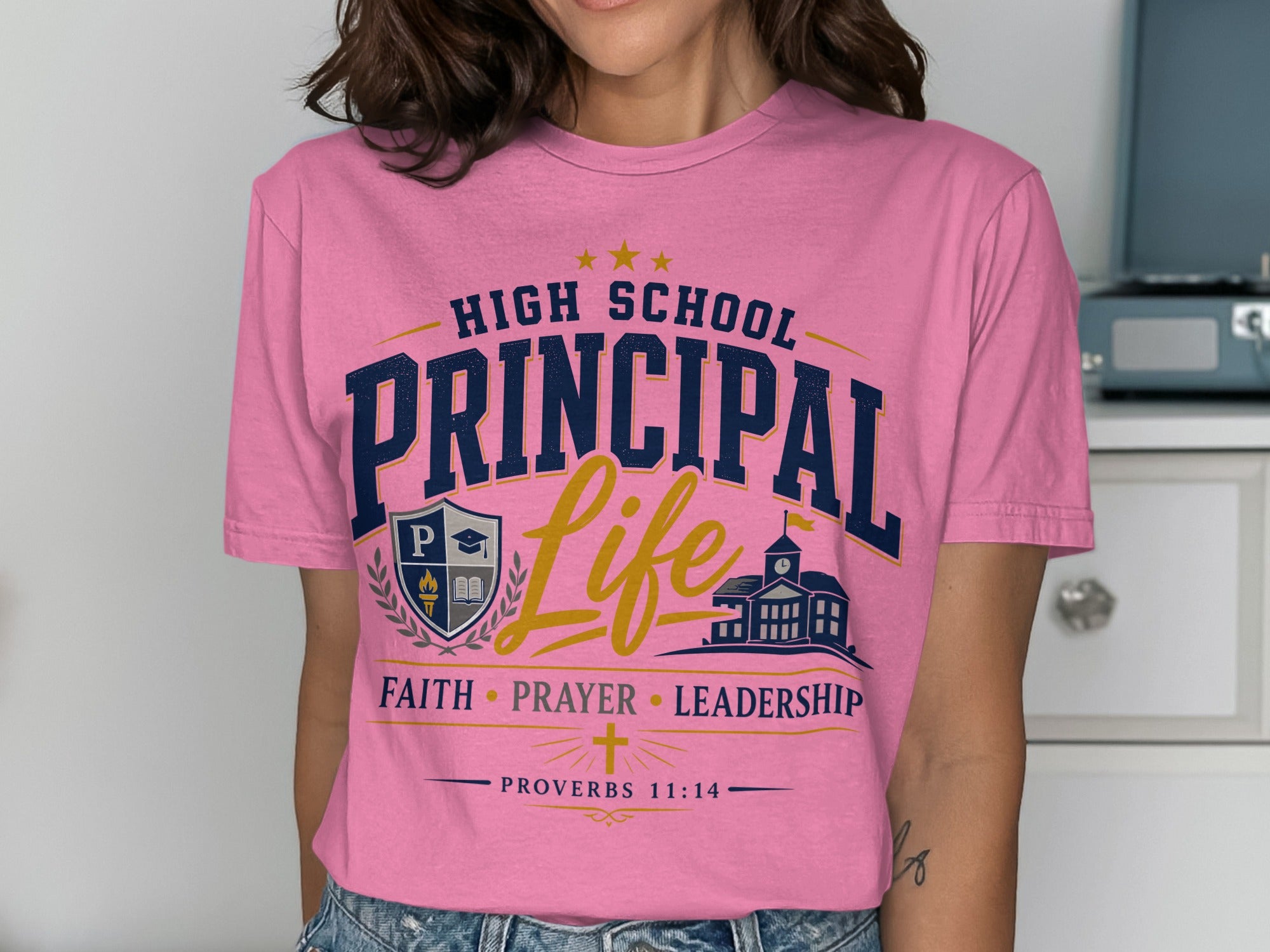 Pink t-shirt with "High School Principal Life" text and school emblem.