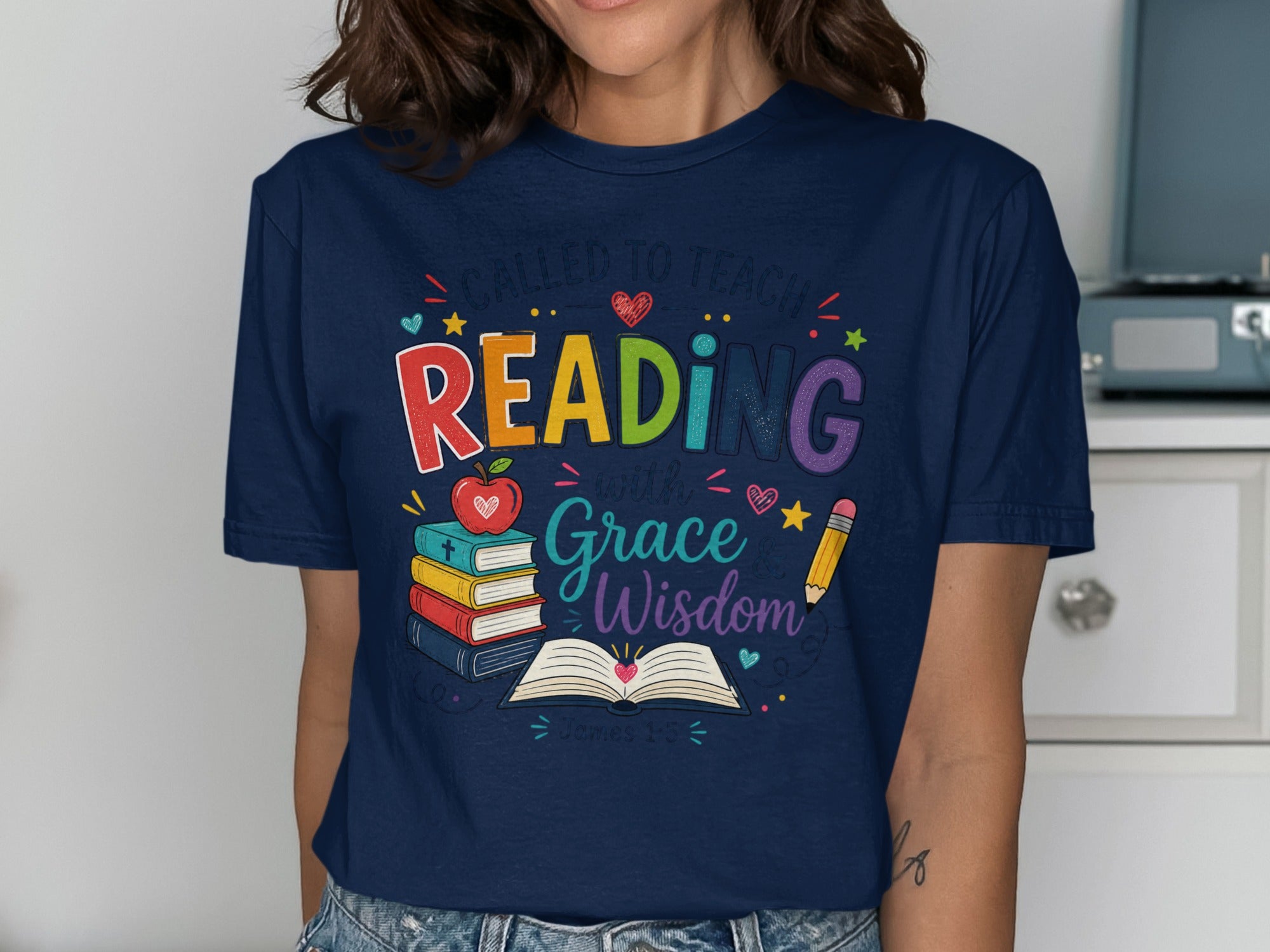 Navy t-shirt with "READING with Grace Wisdom" and books, heart, pencil graphics.
