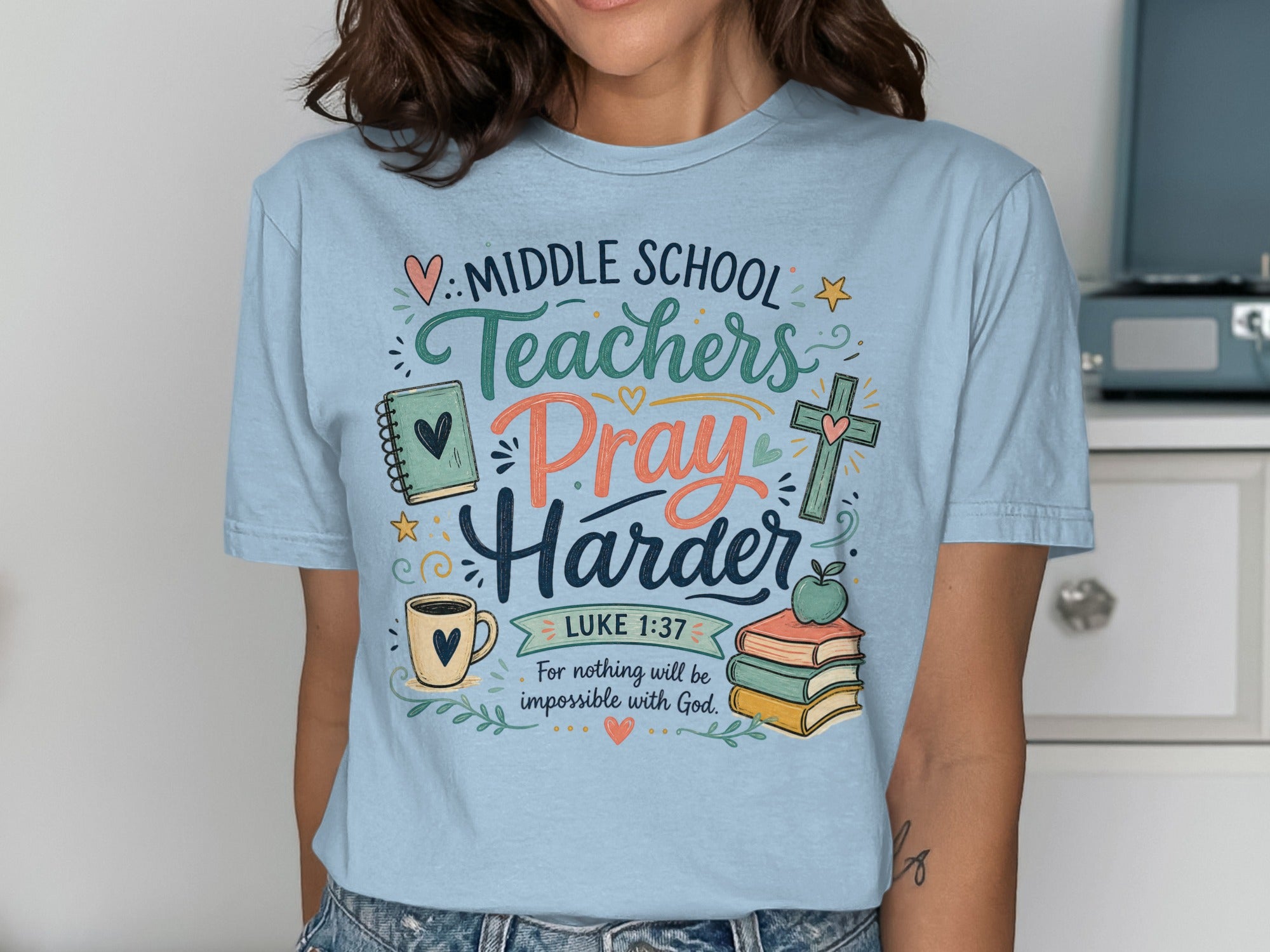 Light blue t-shirt with "Middle School Teachers Pray Harder" and Luke 1:37.