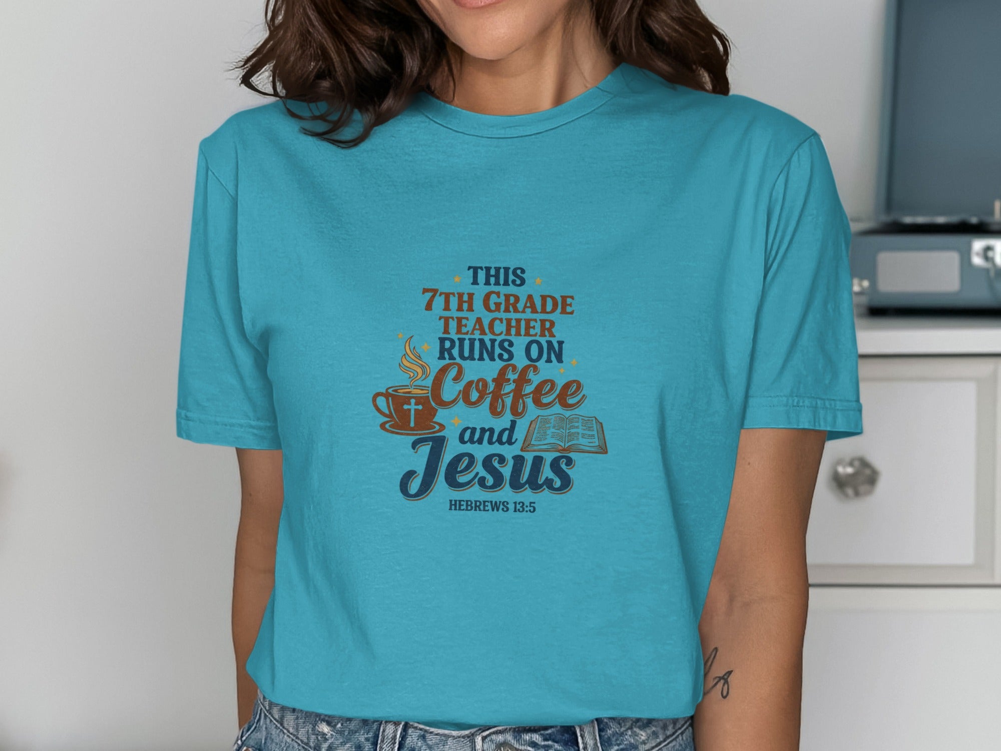 Turquoise t-shirt with "This 7th grade teacher runs on coffee and Jesus. Hebrews 13:5" text.