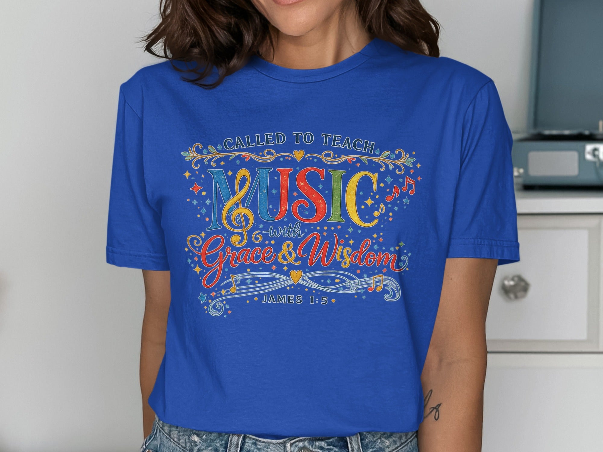 Blue t-shirt with "Called to Teach Music with Grace & Wisdom" and James 1:5.