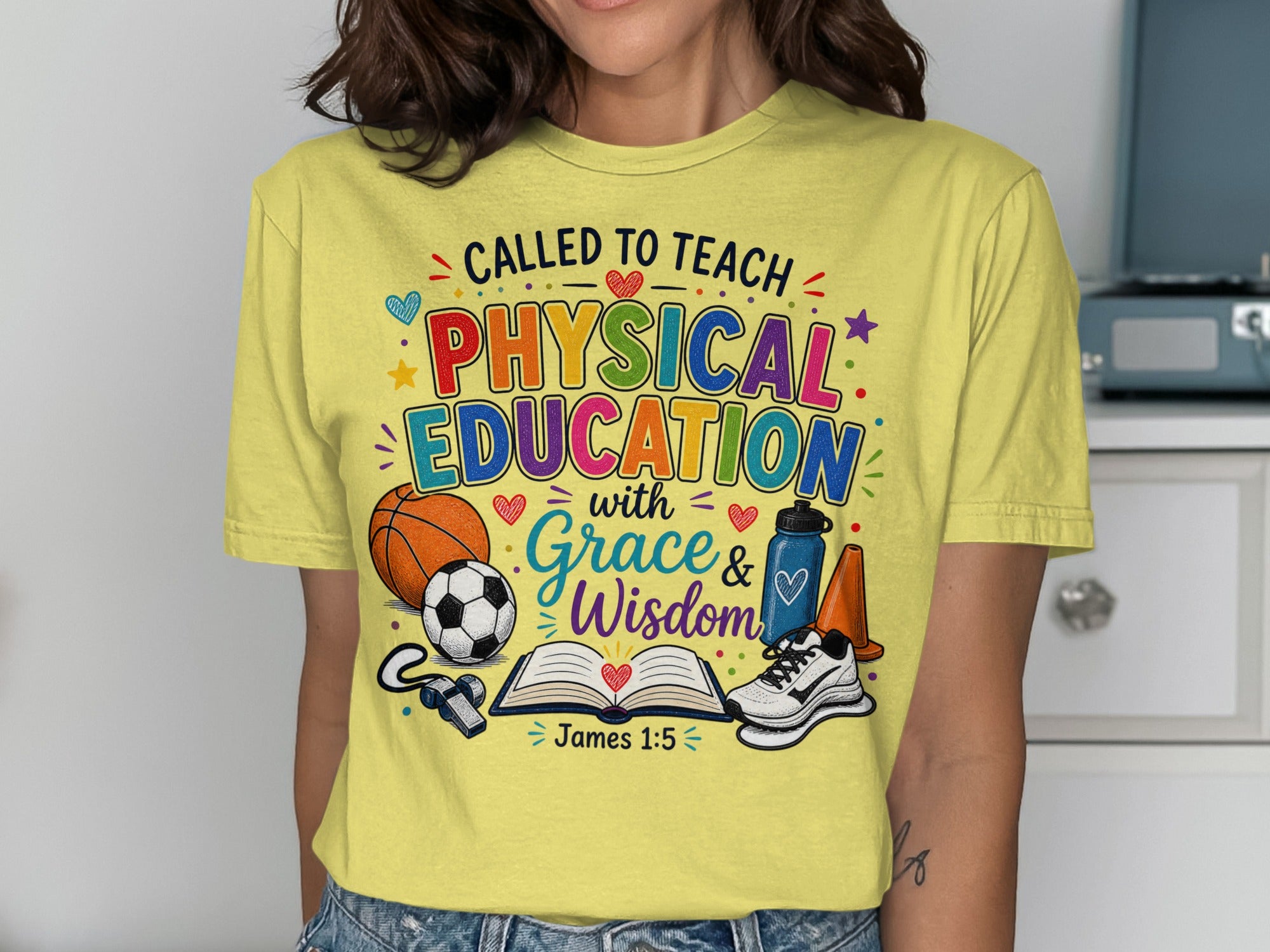 T-shirt with "Called to Teach Physical Education" and Bible verse James 1:5.