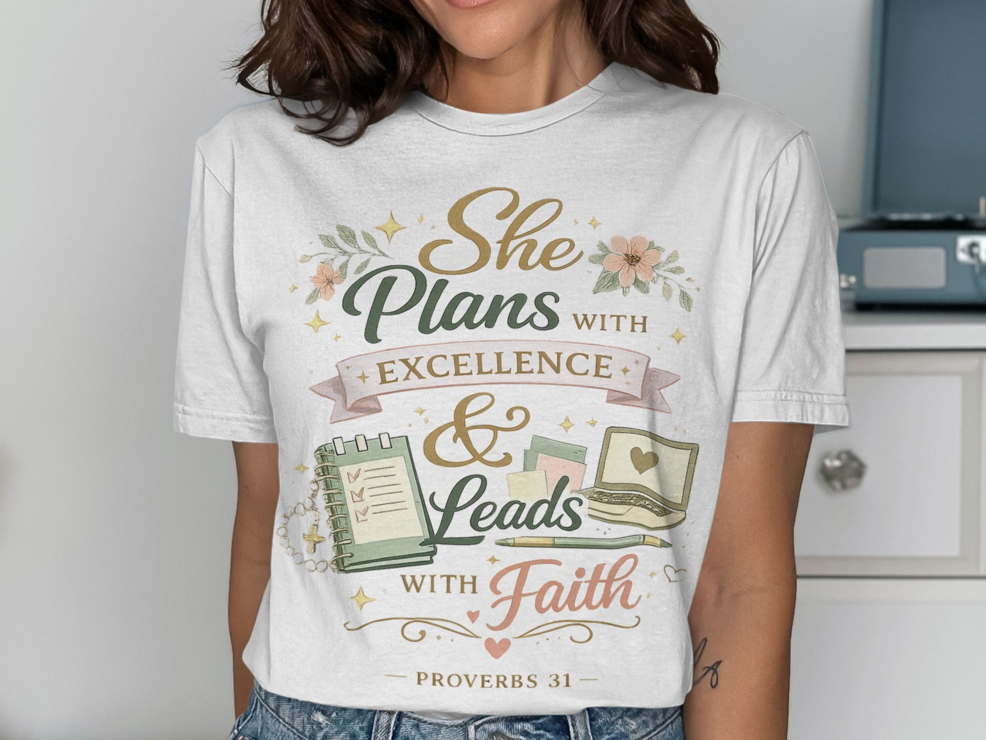 T-shirt with "She Plans with Excellence & Leads with Faith" and Proverbs 31 quote.
