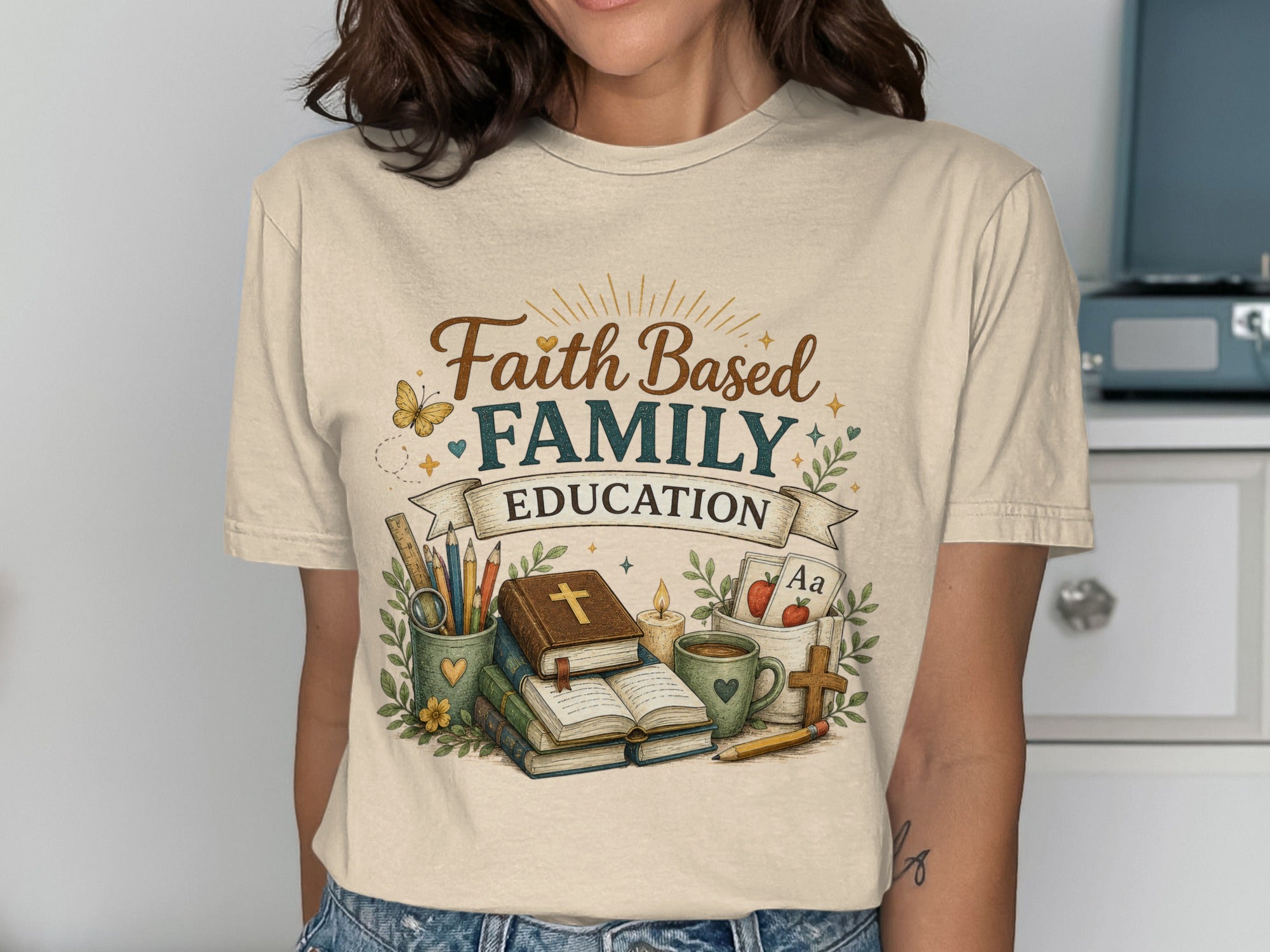 T-shirt with "Faith Based Family Education" text and stack of books.