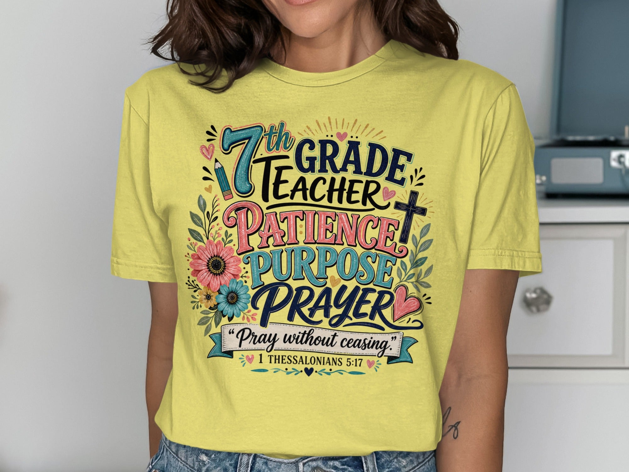 Yellow t-shirt with "7th Grade Teacher Patience Purpose Prayer" and Bible verse.