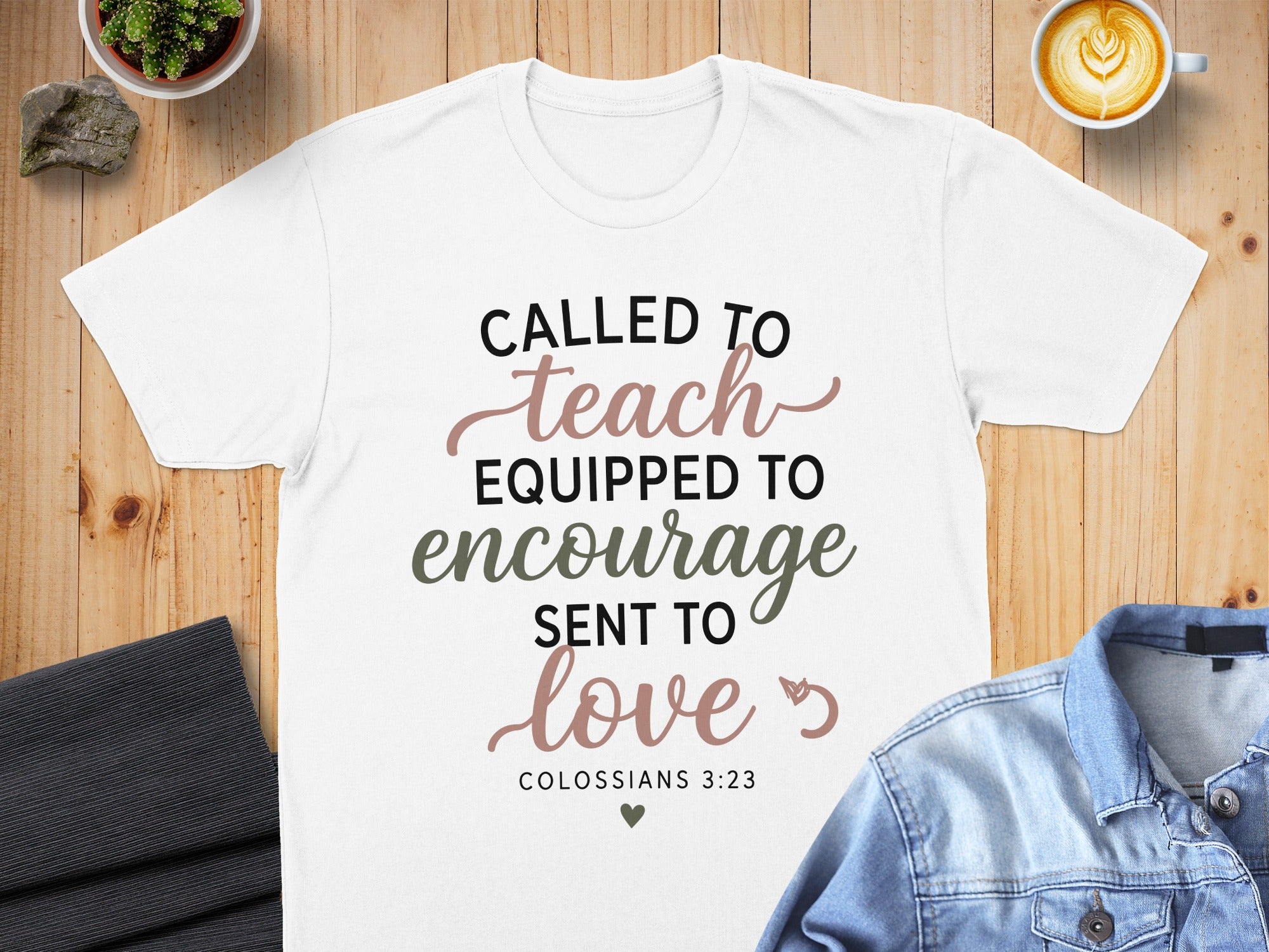White t-shirt with "Called to Teach, Equipped to Encourage, Sent to Love" text.