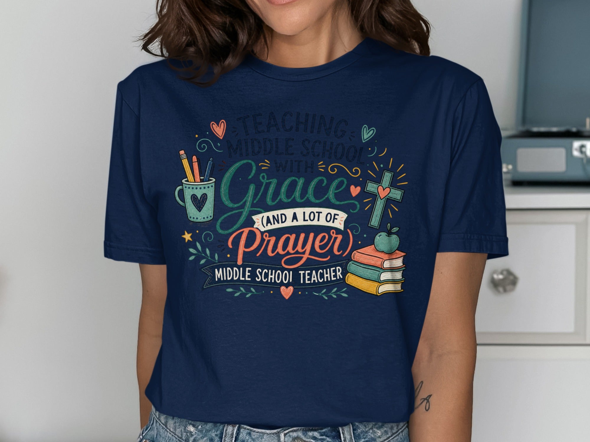 Dark blue t-shirt with "Teaching Middle School with Grace and a lot of Prayer" text and graphics.