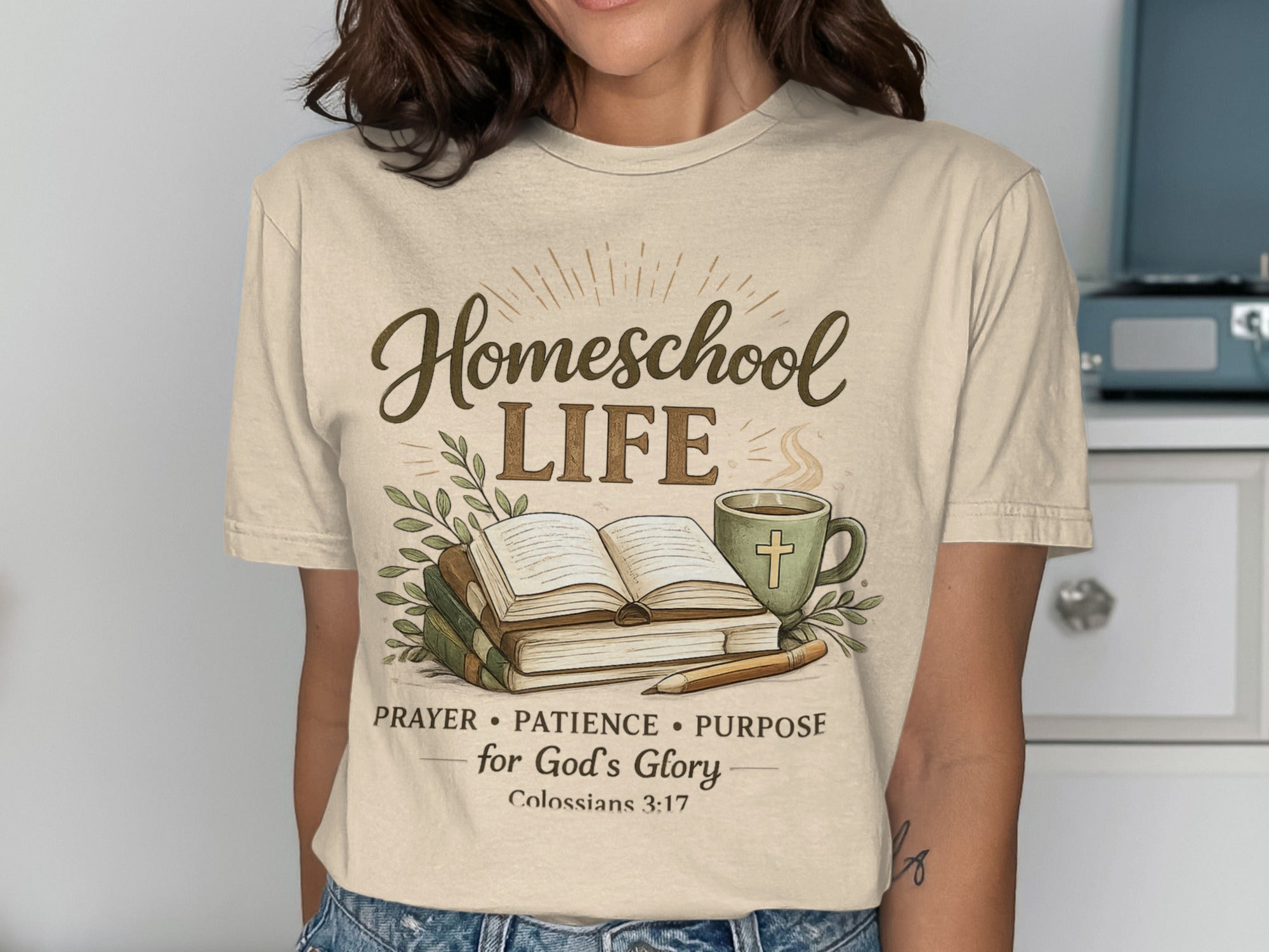 T-shirt design with "Homeschool Life" text, open book, coffee, and a bible verse.