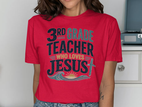 Red t-shirt with "3rd Grade Teacher Who Loves Jesus" text and a cross.