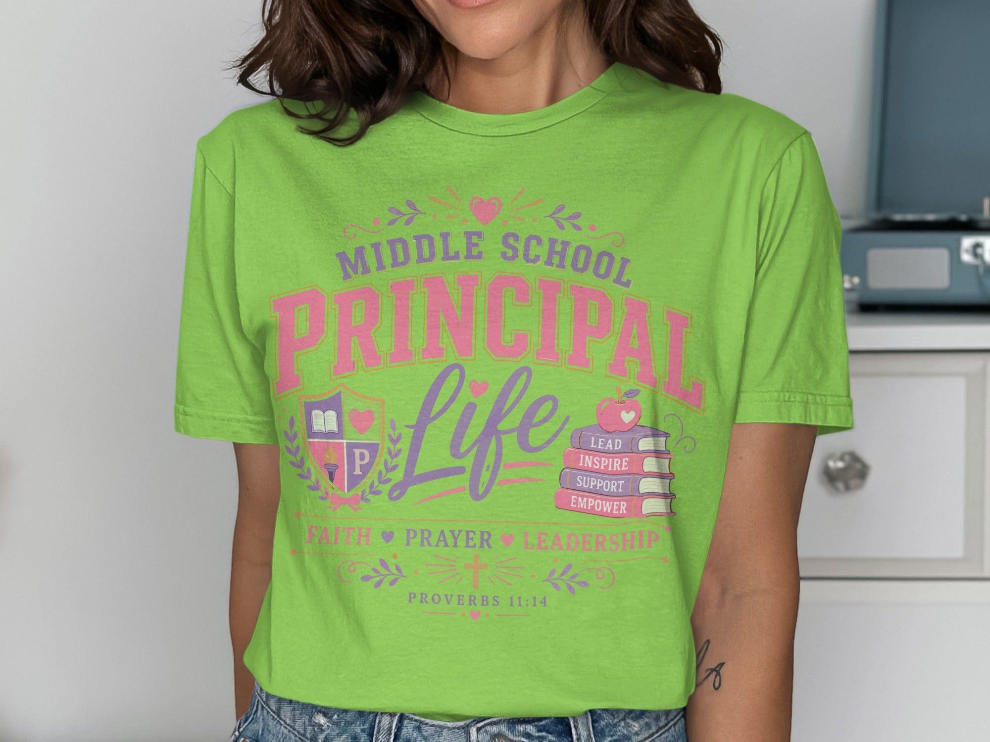 Green t-shirt with "Middle School Principal Life" text and Proverbs 11:14.