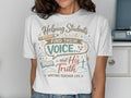 T-shirt with text "Helping Students FIND THEIR VOICE and His Truth WRITING TEACHER LIFE".