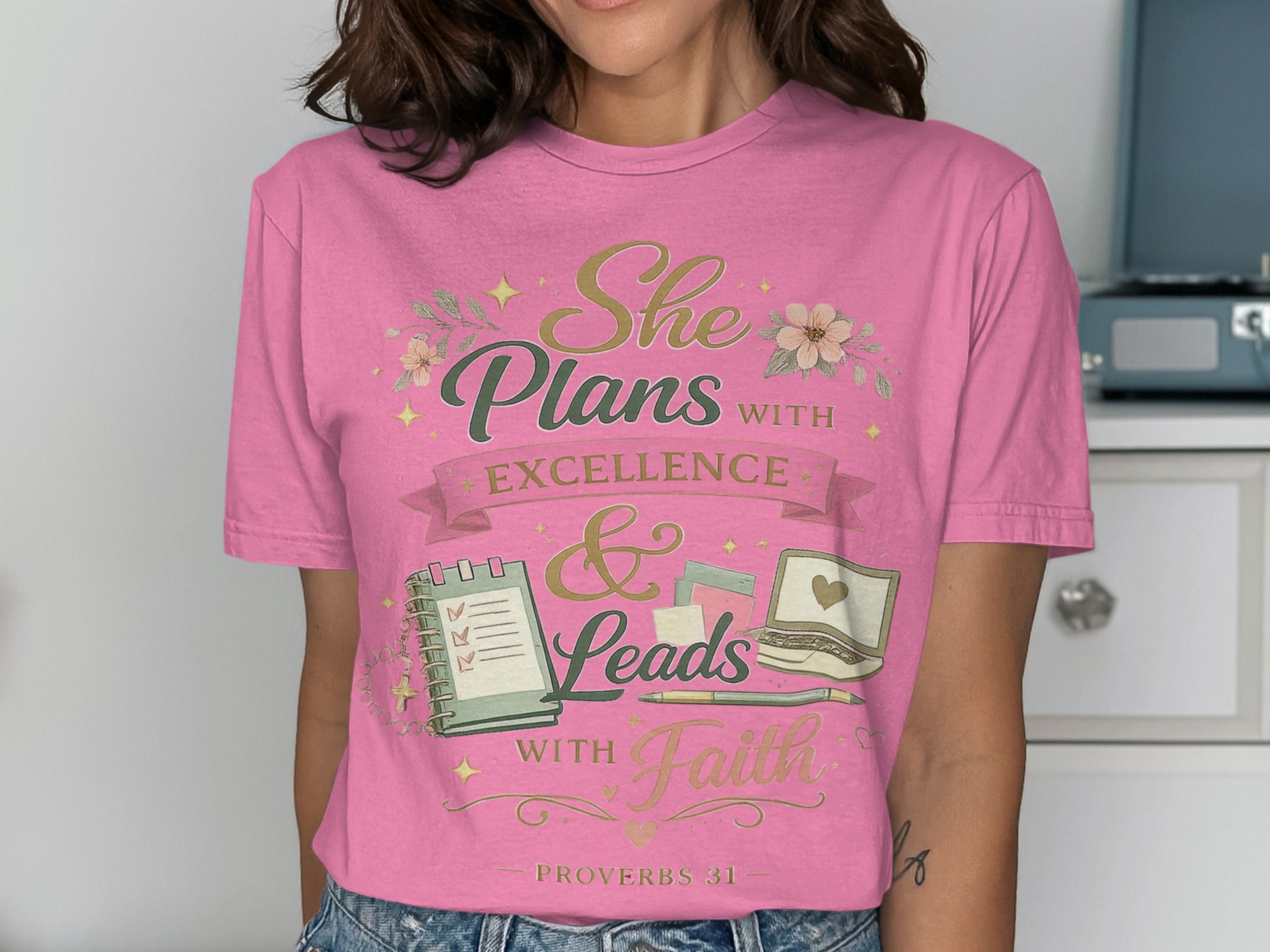 Pink t-shirt with "She Plans with Excellence & Leads with Faith" and Proverbs 31.