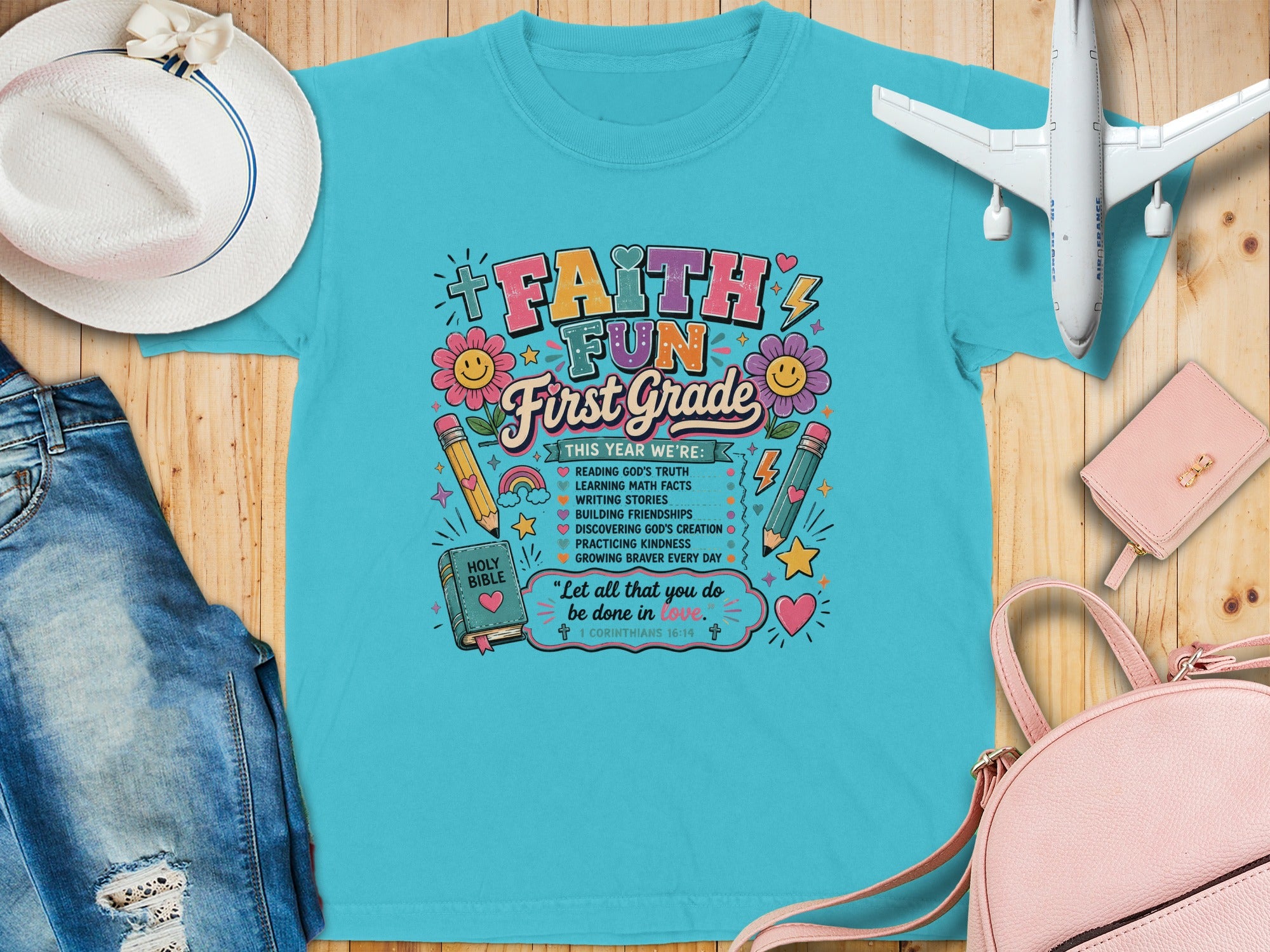 T-shirt with "FAITH FUN First Grade" text and religious activities list.