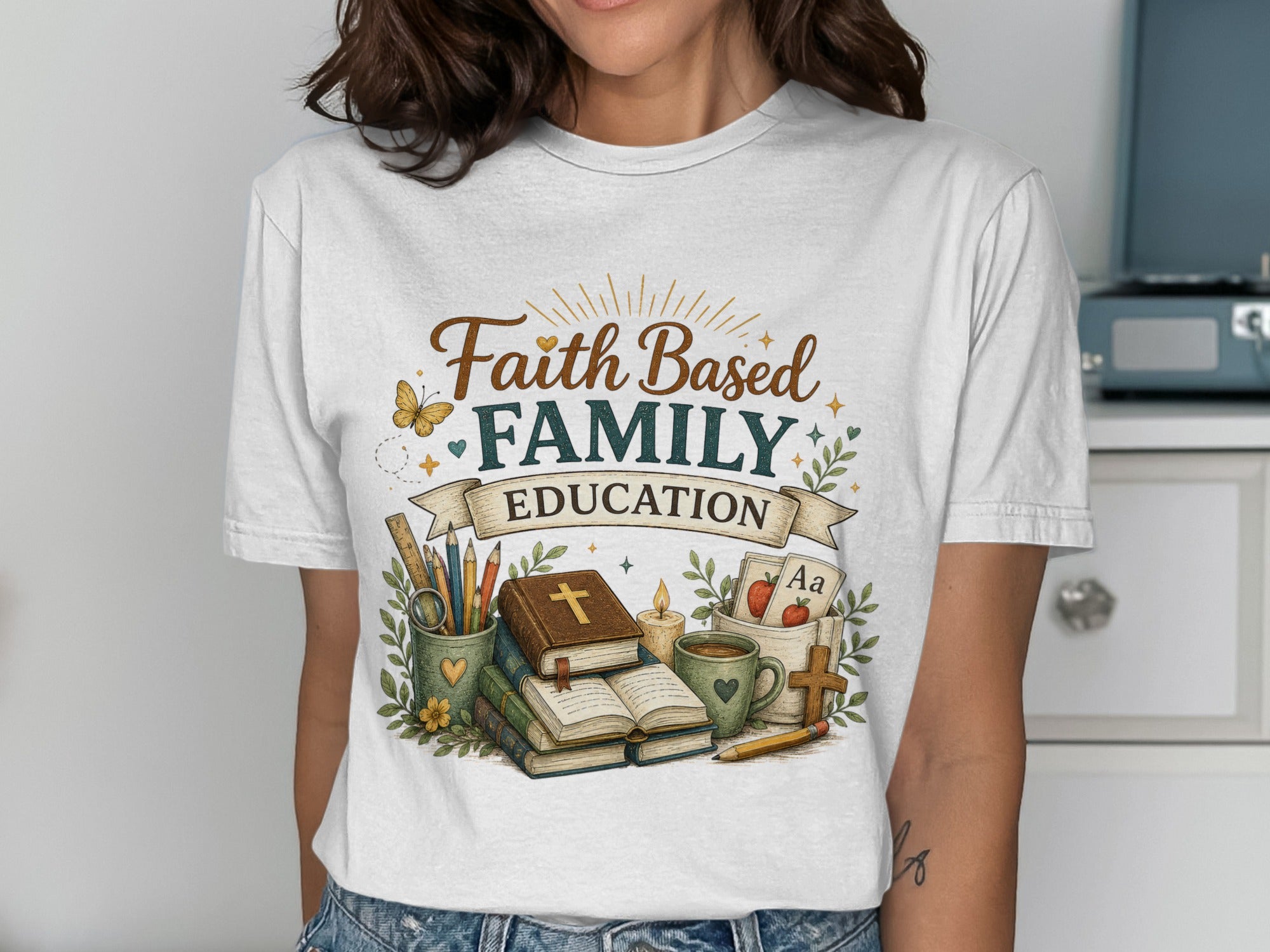 T-shirt with "Faith Based Family Education" text and school supplies graphic.