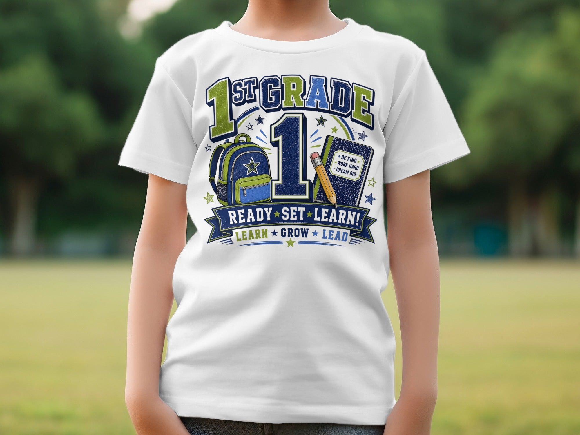 White t-shirt with "1st Grade Ready Set Learn" graphic, backpack, and pencil.