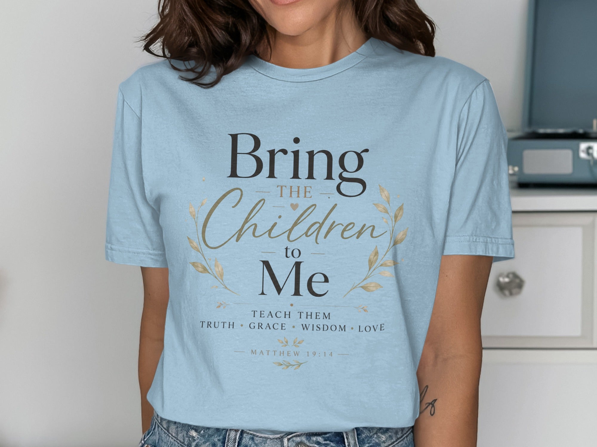 Light blue t-shirt with "Bring the Children to Me" and Matthew 19:14.