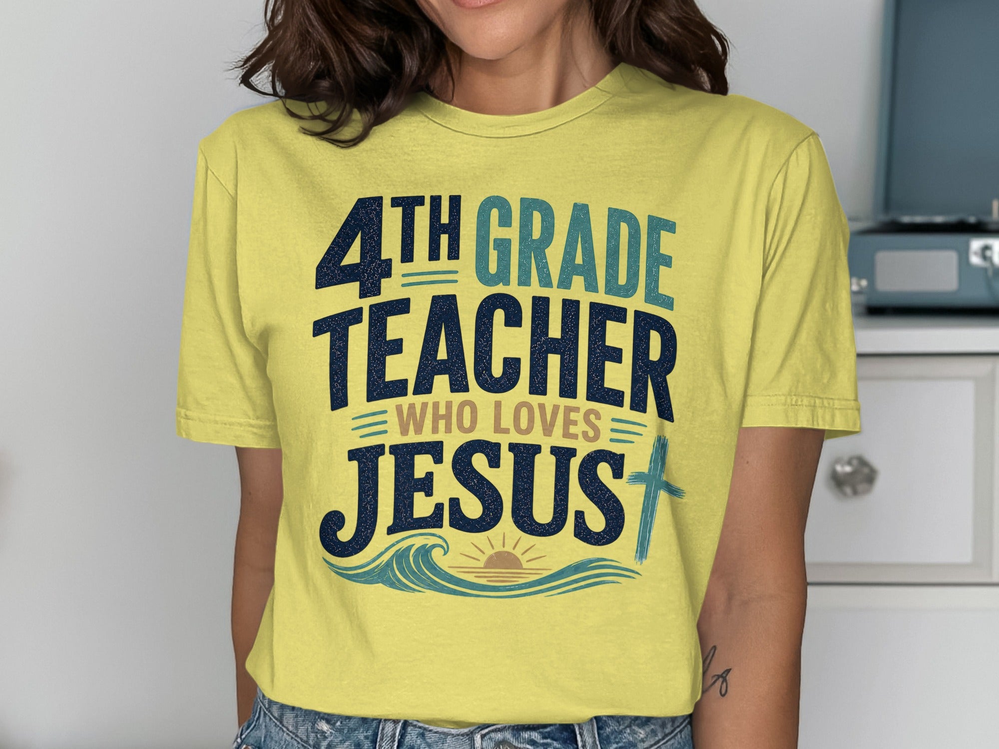 4th grade teacher who loves Jesus shirt with wavy lines and a cross.