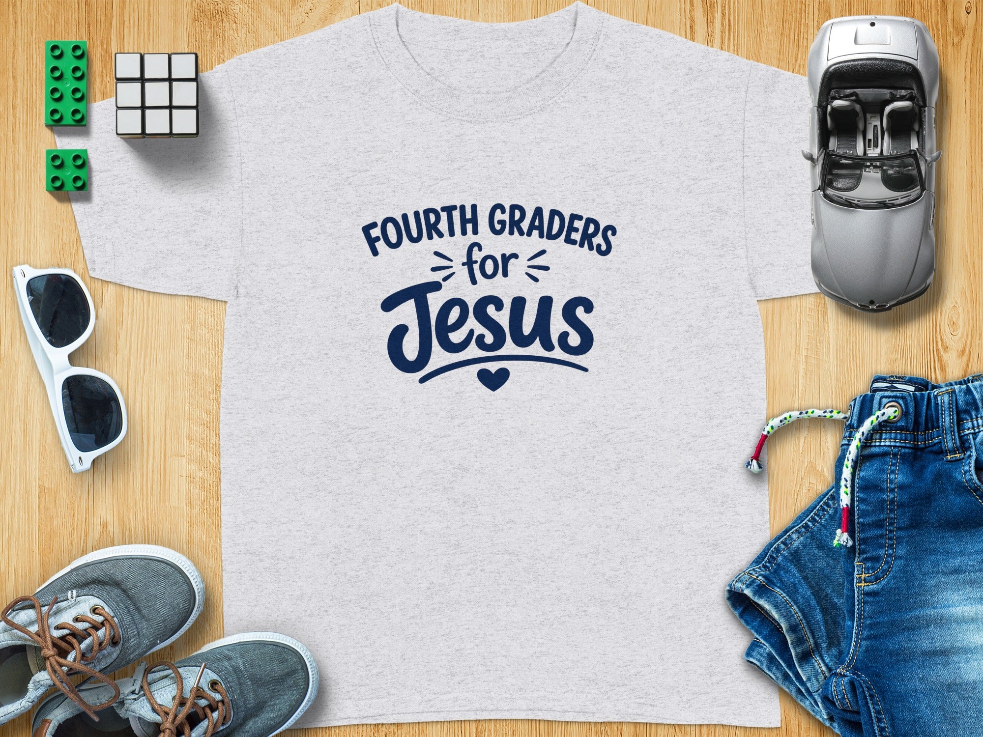 Gray t-shirt with "Fourth Graders for Jesus" text and a heart design.