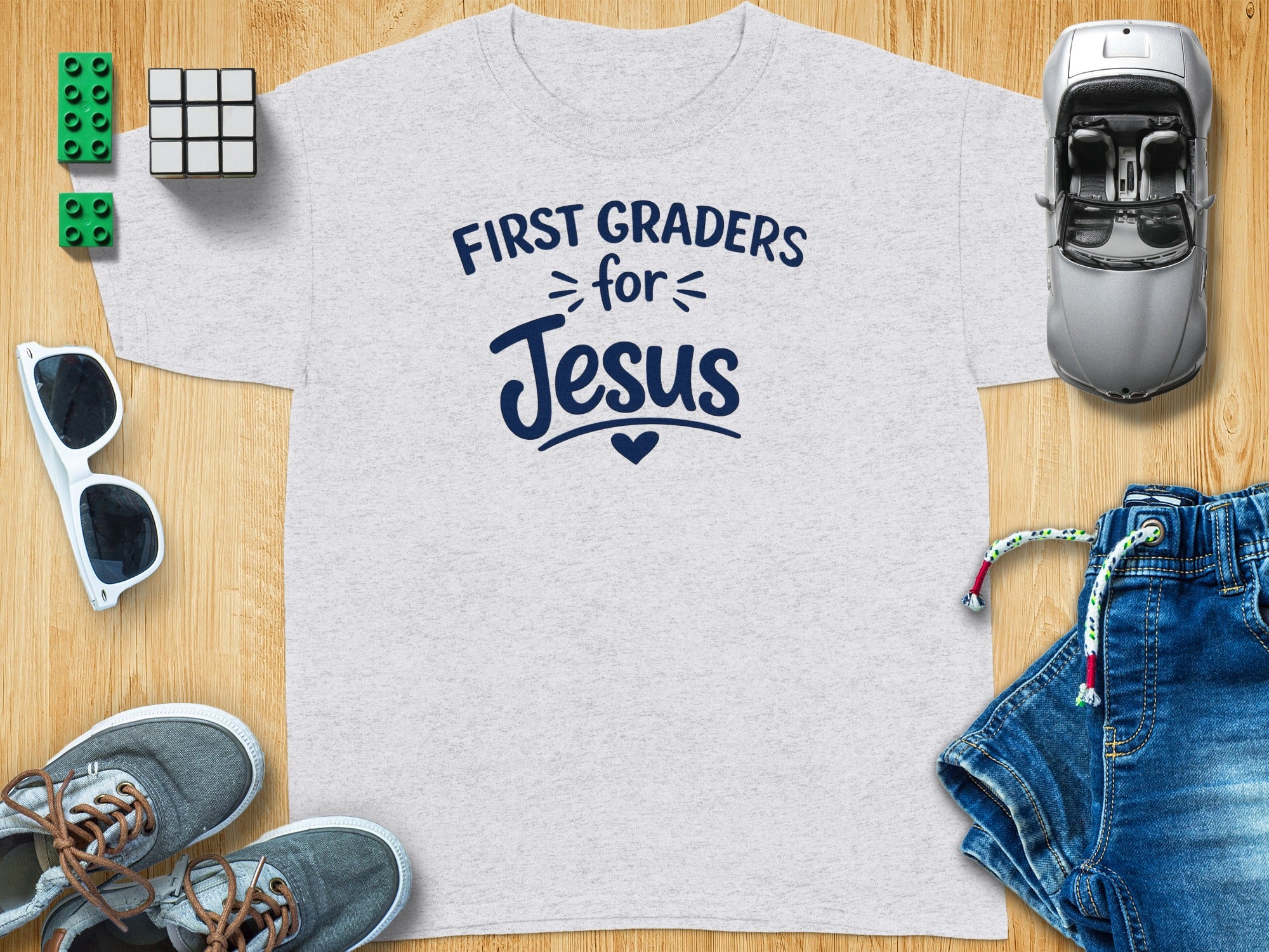 Light gray t-shirt with "First Graders for Jesus" text.