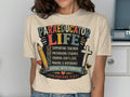 T-shirt with "Paraeducator Life" and related phrases, with Colossians 3:23.