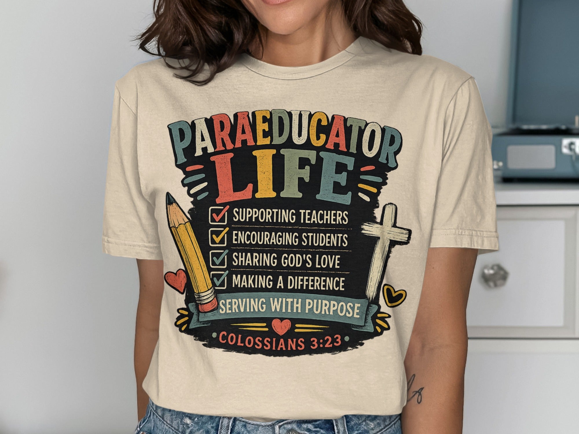 T-shirt with "Paraeducator Life" and related phrases, with Colossians 3:23.