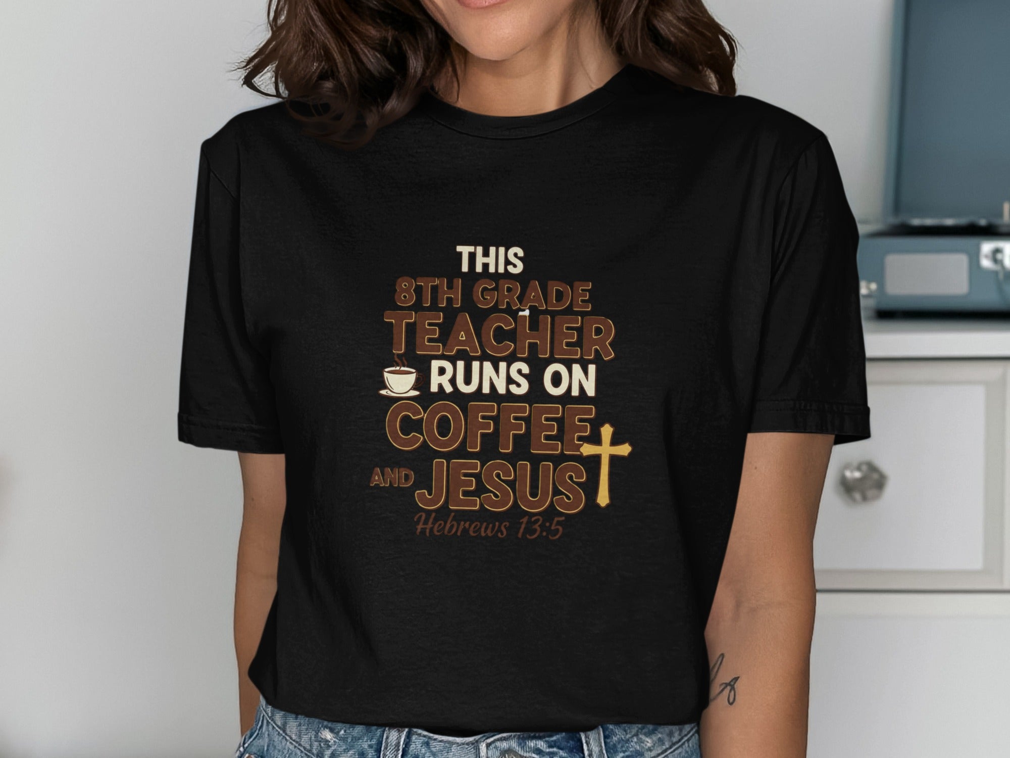 Black t-shirt with text "This 8th grade teacher runs on coffee and Jesus Hebrews 13:5".