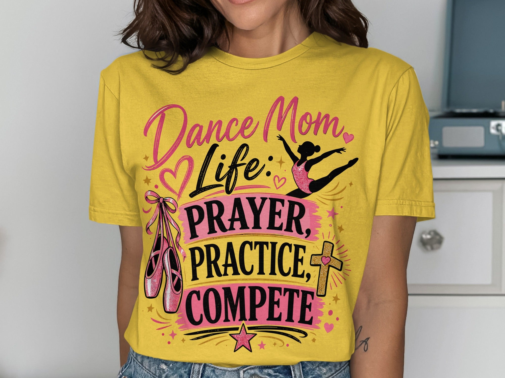 Yellow t-shirt with "Dance Mom Life, Prayer, Practice, Compete" text and ballet shoes.