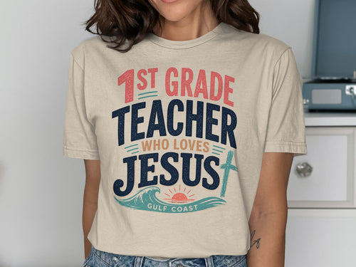 "1st Grade Teacher Who Loves Jesus" text with ocean waves and a cross.
