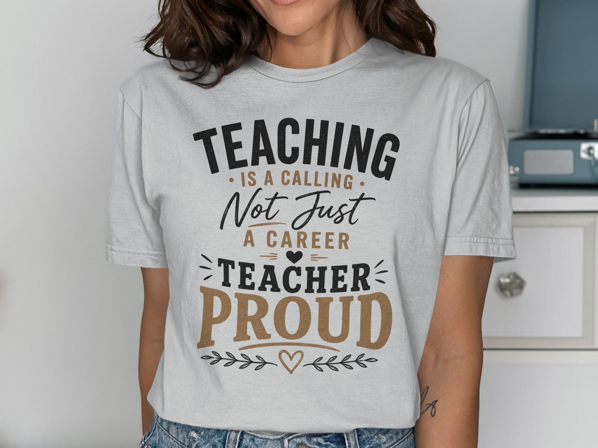 T-shirt with text "Teaching is a calling, not just a career. Teacher Proud."