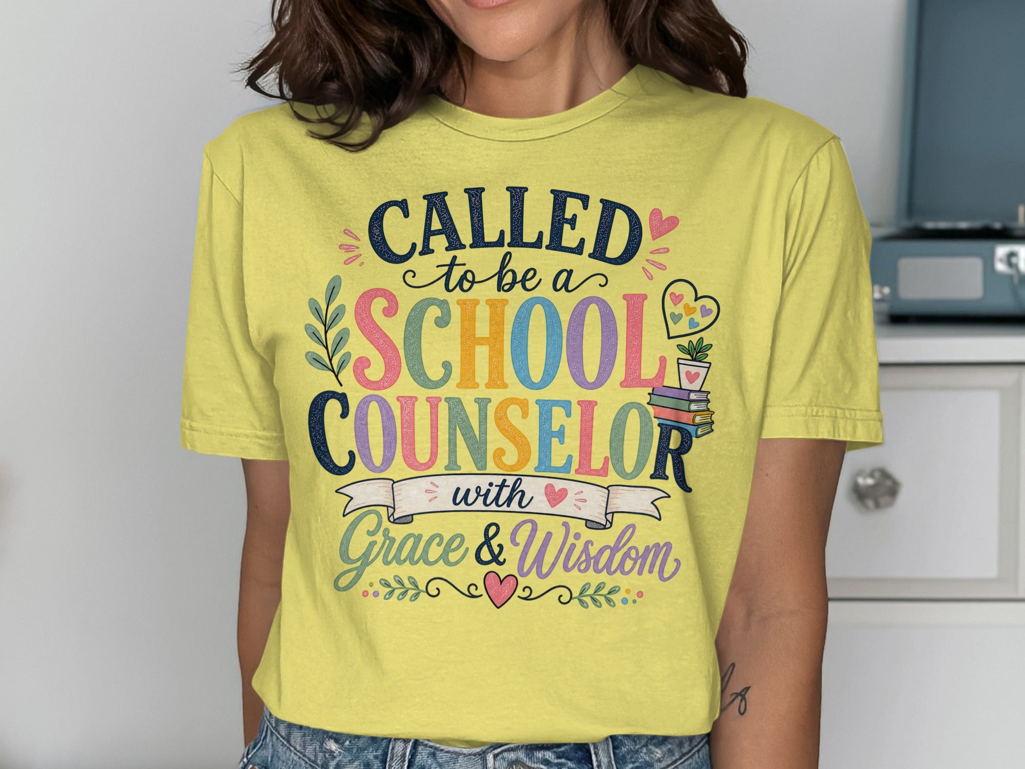 Yellow t-shirt with "Called to be a School Counselor with Grace & Wisdom" text.
