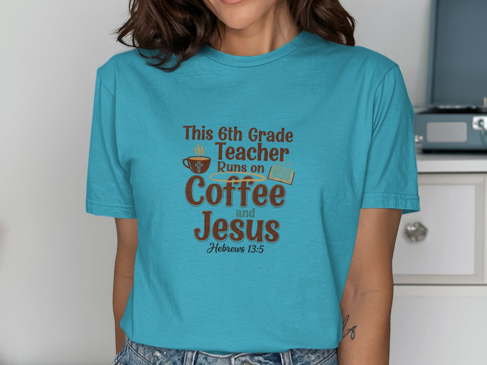 Turquoise t-shirt with "This 6th Grade Teacher Runs on Coffee and Jesus" text and Hebrews 13:5.