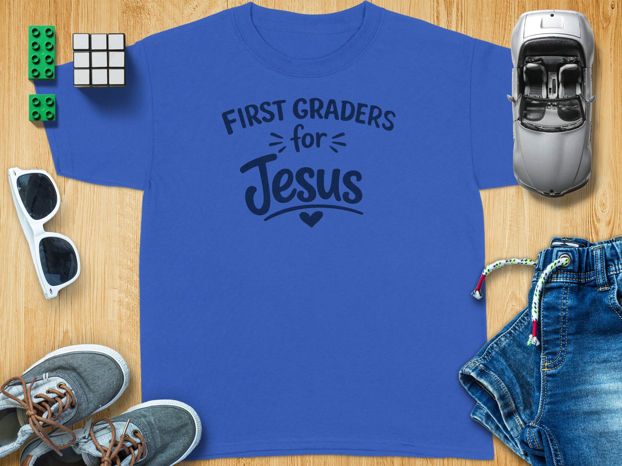 Blue t-shirt with "First Graders for Jesus" text.