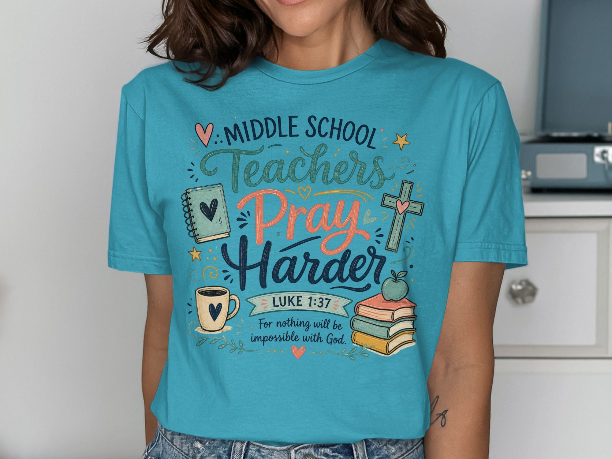 T-shirt with "Middle School Teachers Pray Harder Luke 1:37" and religious graphics.