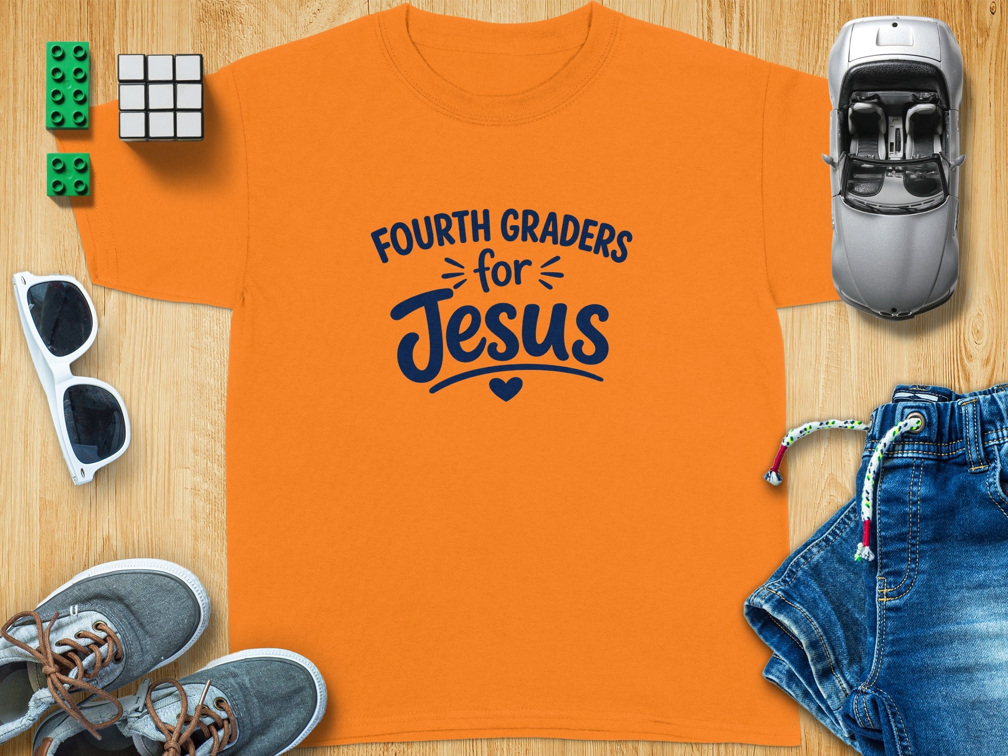 Orange t-shirt with "Fourth Graders for Jesus" text and graphic.